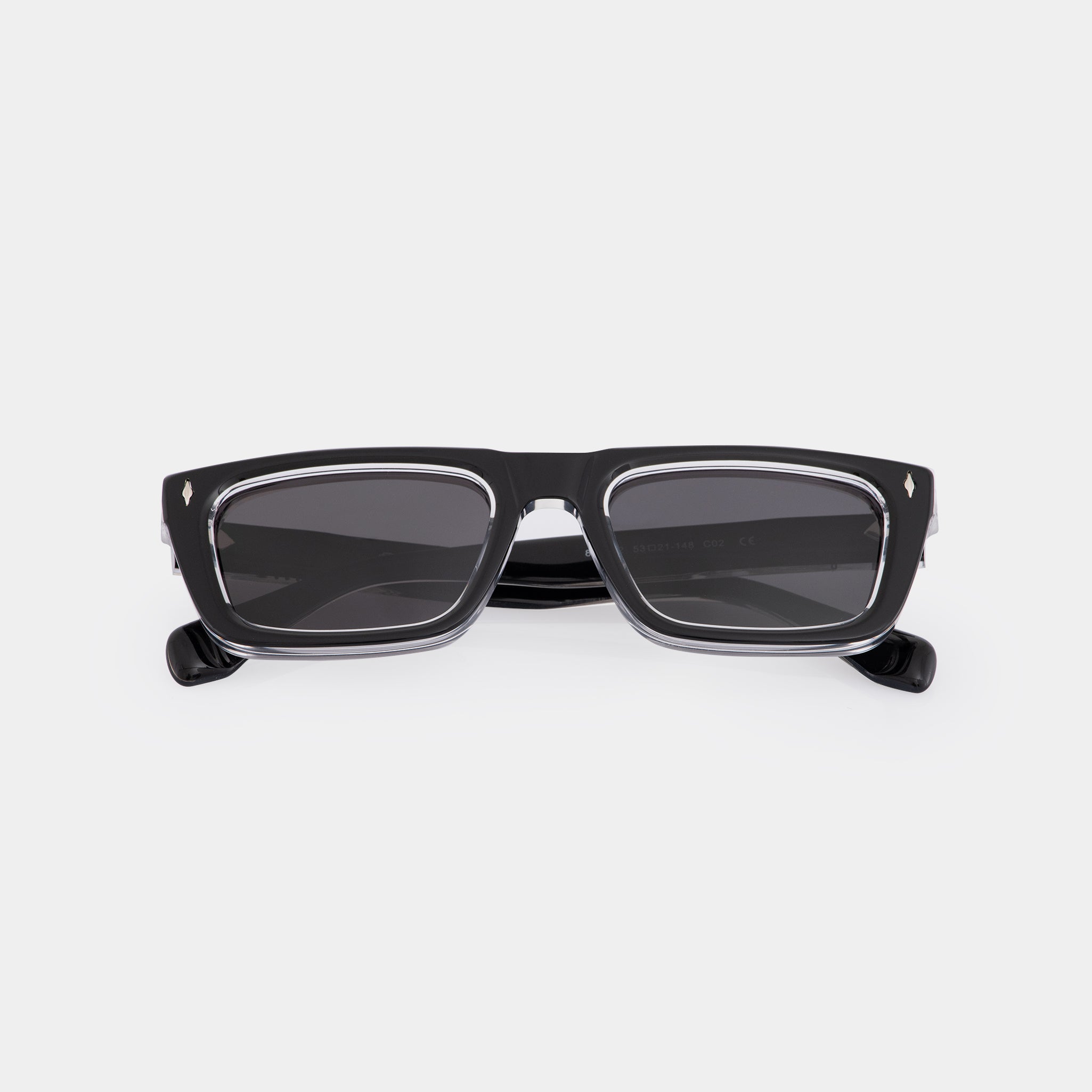 Lentes modernos en acetato negro – estructura resistente con forma vanguardista.

