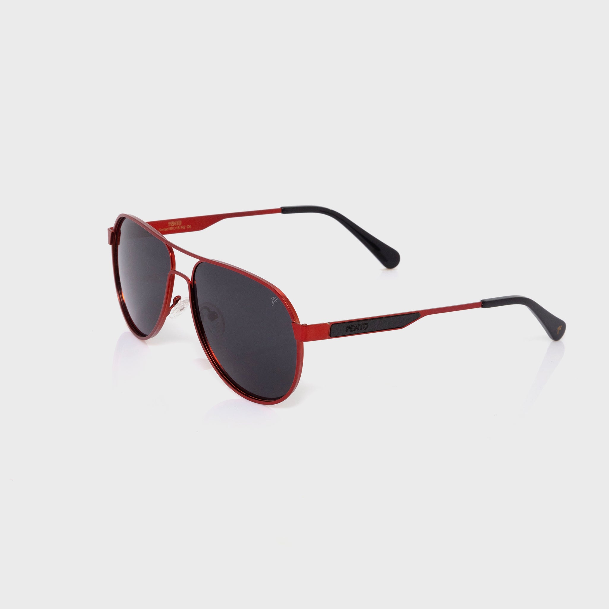 Lentes solares Nomad de acero rojo – diseño audaz, ligero y resistente.