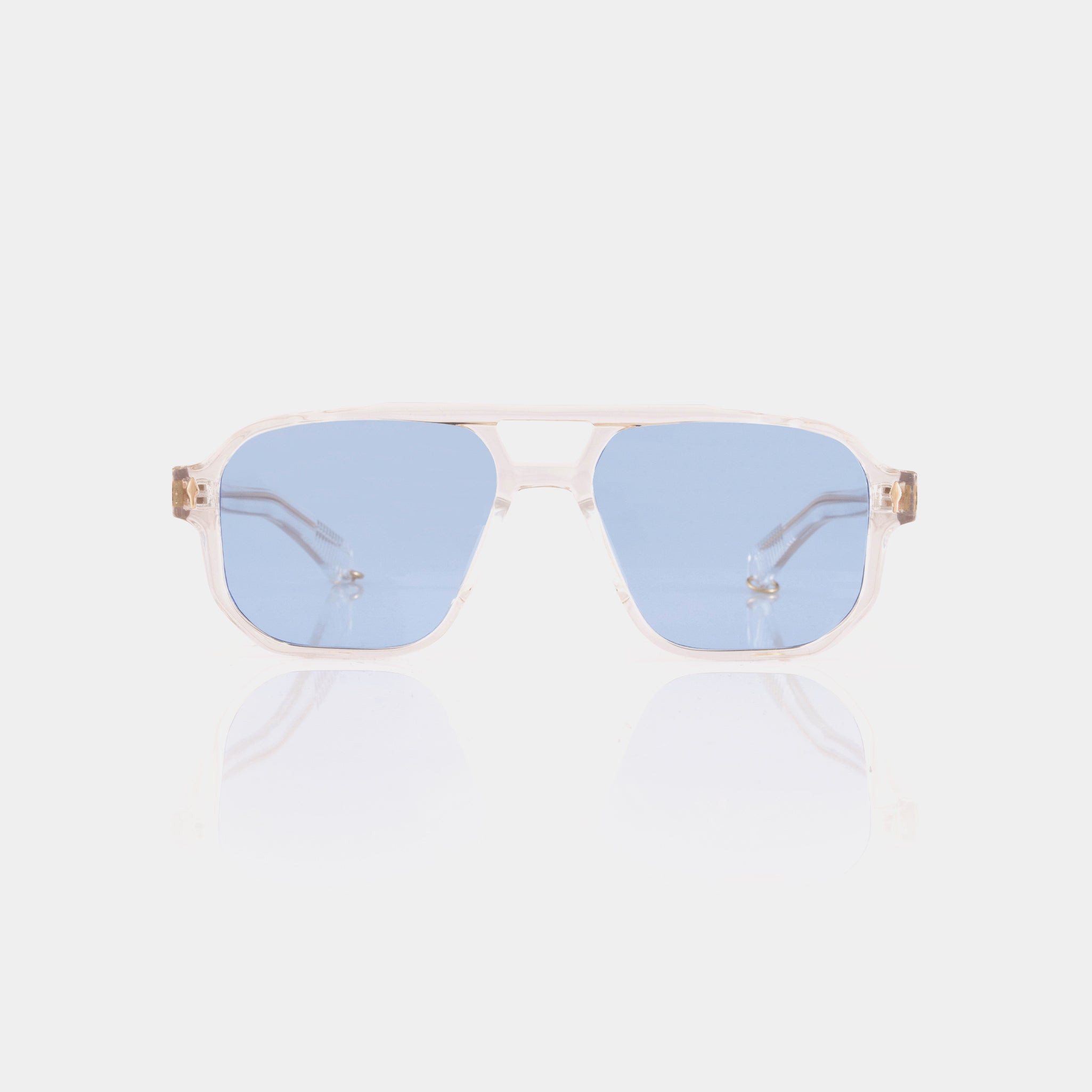 Gafas de sol Sunna, FENTO: acetato transparente, vibe clásico y gafas cuadradas y protección UV. Diseñadas en Medellín. Envíos en Colombia. Compra online.