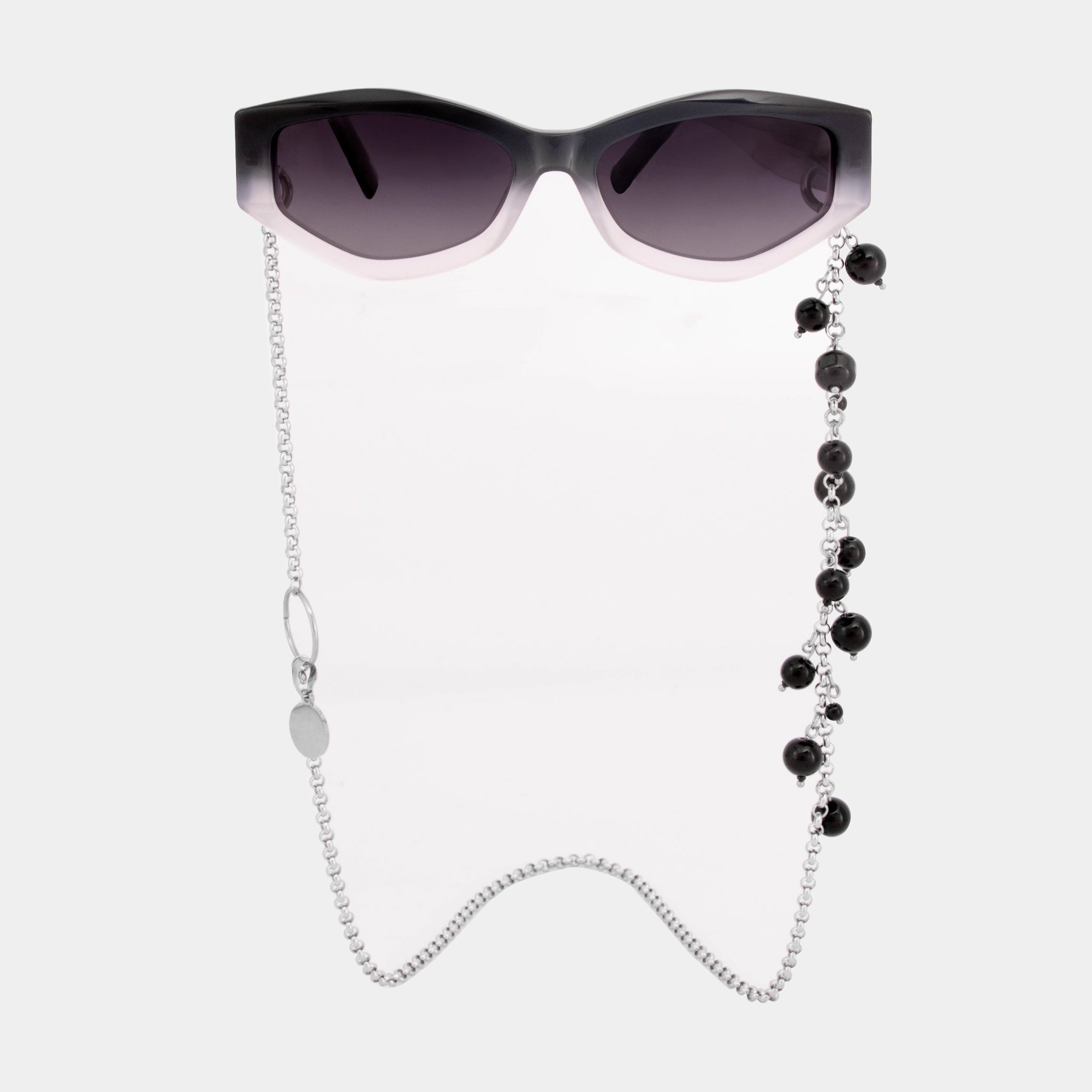 Gafas de sol Arena , FENTO: acetato negro degradado, vibe clásico y protección UV. Diseñadas en Medellín. Envíos en Colombia. Compra online.