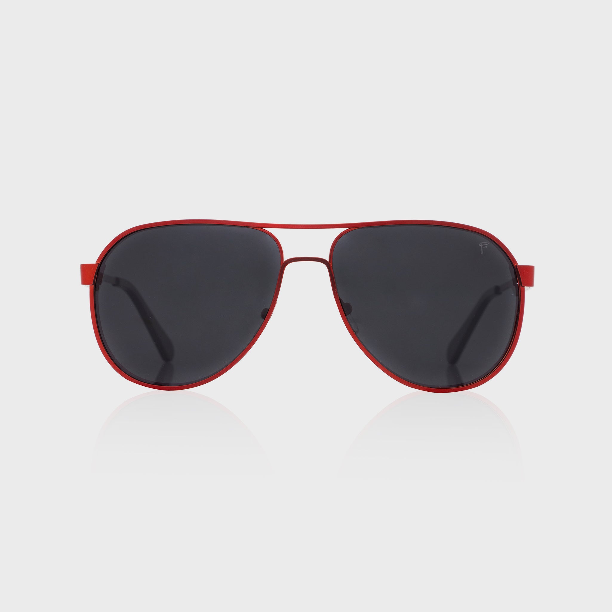 Gafas de sol Nomad – montura de acero inoxidable en vibrante color rojo.